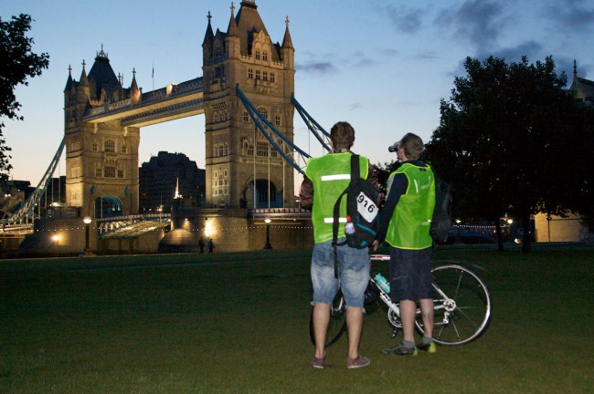 Cyclists in front of Tower Bridge