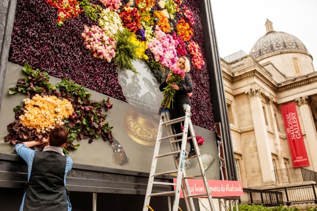 Finishing touches added to the installation by the florists. Photo by Catherine Pound Photography